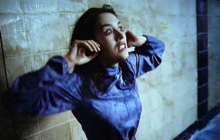 Isabelle Adjani in the subway scene from Possession, mid-breakdown, contorted in anguish.